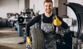 car-mechanic-changing-wheels-car.jpg