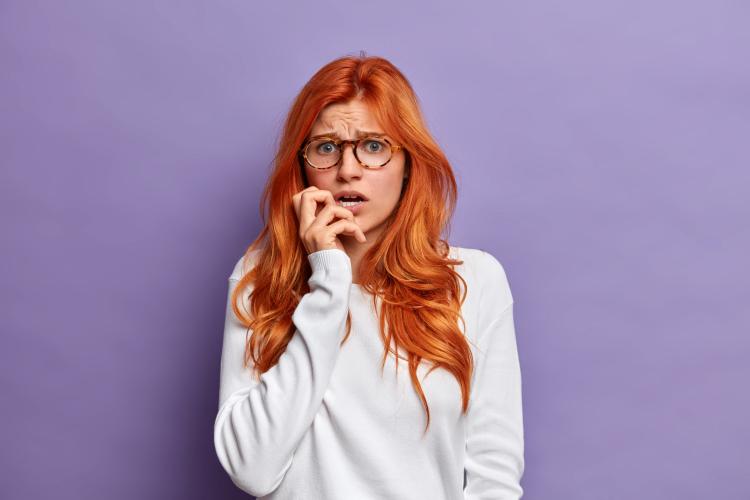 close-up-young-redhead-woman-gesturing.jpg