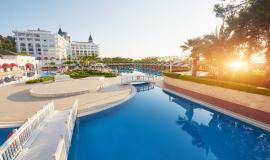 popular-resort-amara-dolce-vita-luxury-hotel-with-pools-water-parks-recreational-area-along-sea-coast-turkey-sunset-tekirova-kemer.jpg