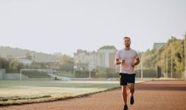 man-athlete-jogging-stadium-morning.jpg