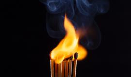 wooden-matches-burning-with-dark-background.jpg