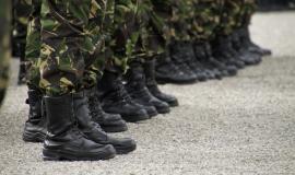 selective-focus-shot-of-soldiers-standing-on-the-line_181624-52012.jpg