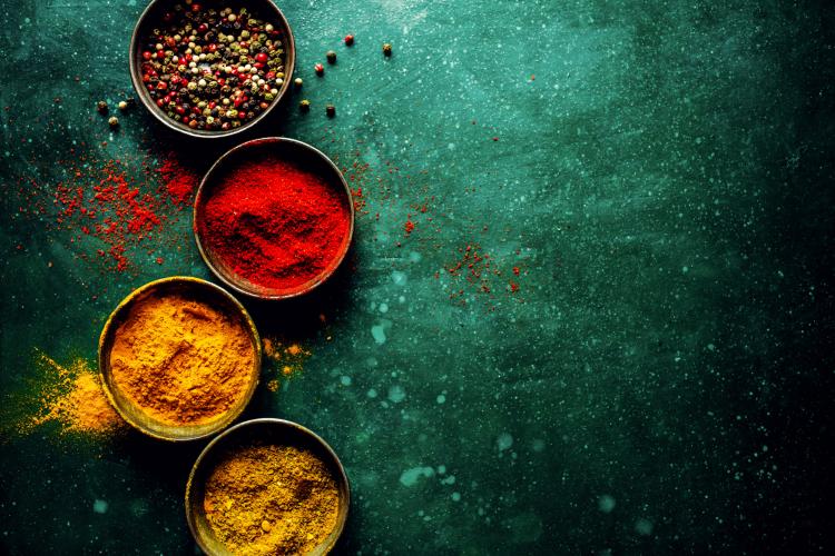colorful-spices-on-dark-table.jpg