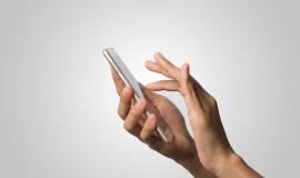 woman-hand-holding-smart-phone-blank-screen-copy-space-hand-holding-smartphone-isolated-on-white-background.jpg