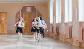 cheerful-kids-running-in-school-corridor.jpg