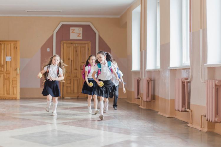 cheerful-kids-running-in-school-corridor.jpg