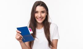 portrait-young-woman-with-passport.jpg