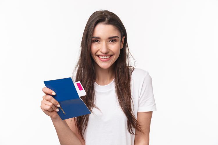 portrait-young-woman-with-passport.jpg