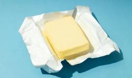 open-package-with-butter-blue-background_185193-89143.jpg