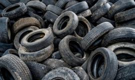big-pile-automobile-tires-broken-down-plant-many-black-rubber-tyres-ground-inside-old-huge-empty-building_116317-5695.jpg