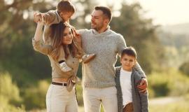 cute-family-playing-in-a-summer-field.jpg