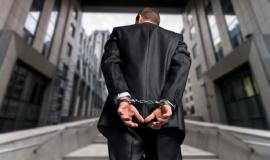 cropped-image-male-hands-handcuffs-his-back_488220-11394.jpg