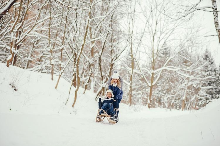 mother-with-cute-son-in-a-winter-oark.jpg