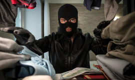 thief-in-a-black-mask-searches-a-wardrobe-in-search-of-money-and-valuables-concept-of-apartment-theft-stealing-clothes_431724-6167.jpg
