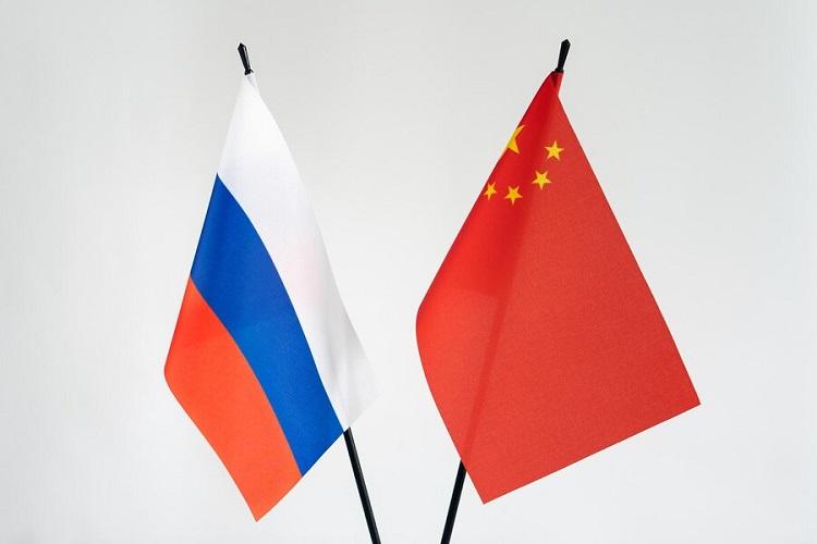 state-flags-of-russia-and-china-on-white-backgroundcooperation-business-alliance-sanctions-concept_538655-1543.jpg