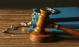 gavel-with-books-on-old-wooden-desk.jpg