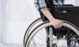 close-up-invalid-person-in-wheelchair.jpg