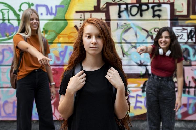 front-view-smiley-girls-bullying-teen.jpg