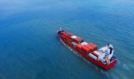 aerial-view-of-container-cargo-ship-in-sea.jpg