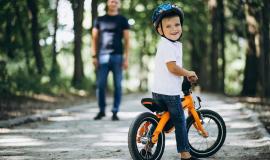 father-teaching-his-little-son-to-ride-a-bicycle.jpg