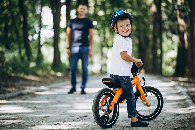 father-teaching-his-little-son-to-ride-a-bicycle.jpg