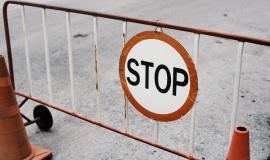 mobile-steel-barrier-fence-with-stop-sign.jpg