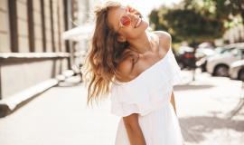 beautiful-cute-smiling-blond-teenager-model-with-no-makeup-in-summer-hipster-white-dress-running-on-the-street-in-sunglasses-turn-around.jpg