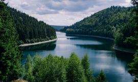 river-surrounded-by-forests-under-a-cloudy-sky-in-thuringia-in-germany.jpg