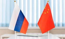 political-flags-of-russia-and-chinese-on-table-in-international-negotiation-room-concept-of-negotiations-collaboration-and-cooperation-of-countries-agreement-between-governments_431724-7680-transformed.jpeg