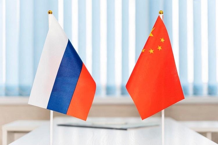 political-flags-of-russia-and-chinese-on-table-in-international-negotiation-room-concept-of-negotiations-collaboration-and-cooperation-of-countries-agreement-between-governments_431724-7680-transformed.jpeg