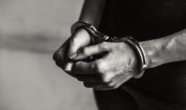 criminal-in-handcuffs.jpg