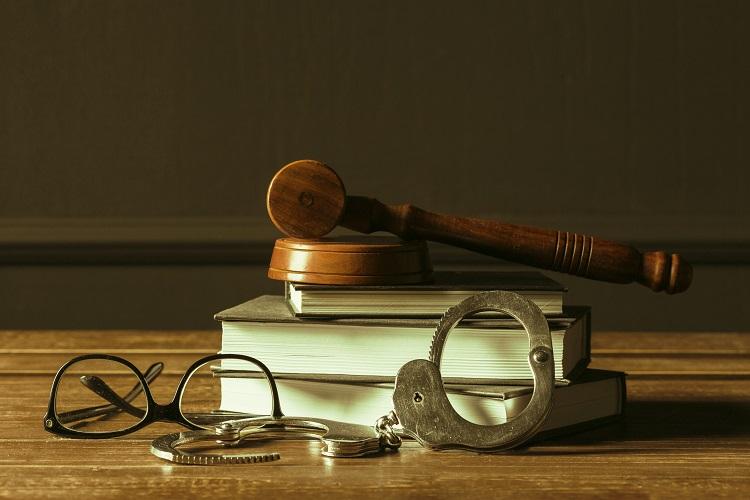 gavel-with-books-on-old-wooden-desk.jpg