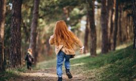 girl-with-her-little-brother-together-in-forest.jpg