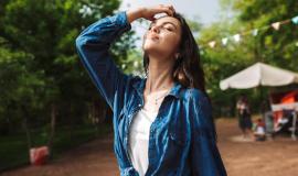 portrait-beautiful-lady-with-wet-hair-denim-shirt-dreamily-closing-her-eyes-while-standing-rain-park_574295-1074.jpg