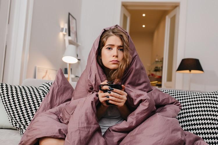 sad-woman-with-beautiful-eyes-drinking-hot-coffee-in-cold-morning.jpg