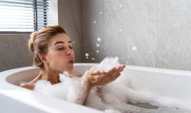 woman-enjoying-relaxing-bubble-bath_23-2149122079.jpg