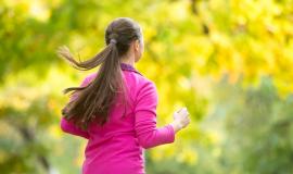 profile-portrait-of-a-young-attractive-woman-jogging-in-the-autu.jpg