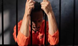 middle-aged-man-spending-time-jail_23-2149098121.jpg