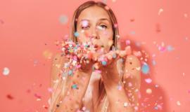 girl-blowing-confetti_23-2148123049.jpg