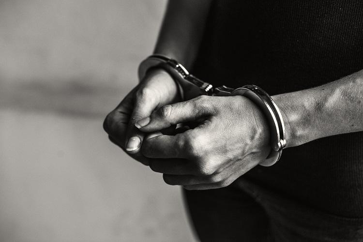 criminal-in-handcuffs (1).jpg