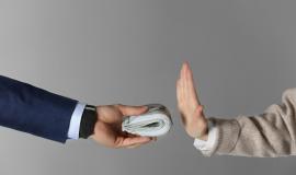 woman-refusing-take-bribe-grey-background-closeup-hands_495423-30310.jpg