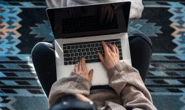 woman-working-sitting-laptop-top-view_169016-19860.jpg