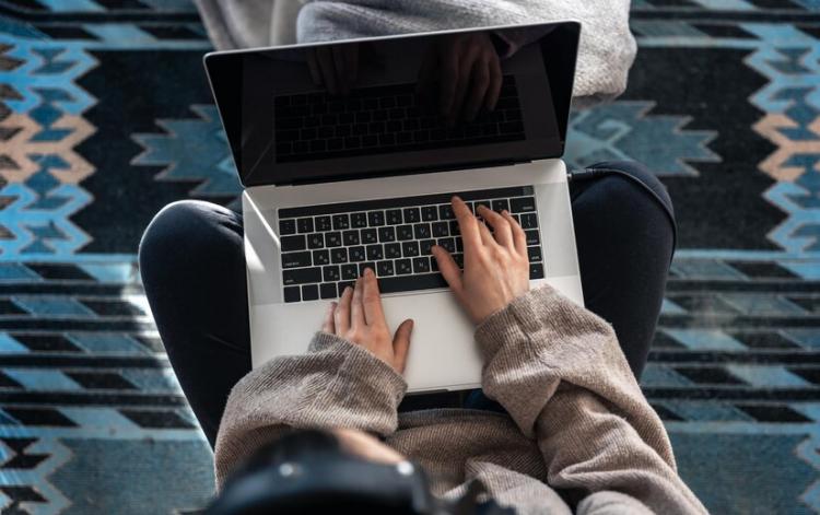 woman-working-sitting-laptop-top-view_169016-19860.jpg