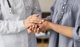 covid-recovery-center-female-doctor-holding-elder-patient-s-hands_23-2148847830.jpg