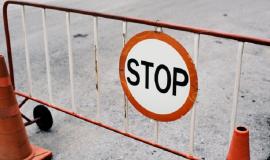 mobile-steel-barrier-fence-with-stop-sign_53876-33512.jpg