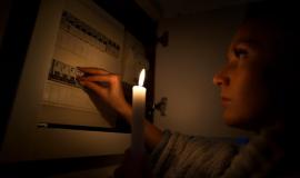 woman-total-darkness-investigating-fuse-box-during-power-outage-blackout-no-electricity_265657-417.jpg