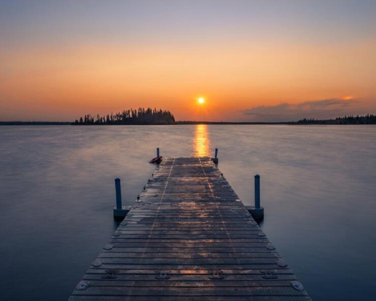 empty-wooden-dock-lake-during-breathtaking-sunset-cool-background_181624-27469.jpg