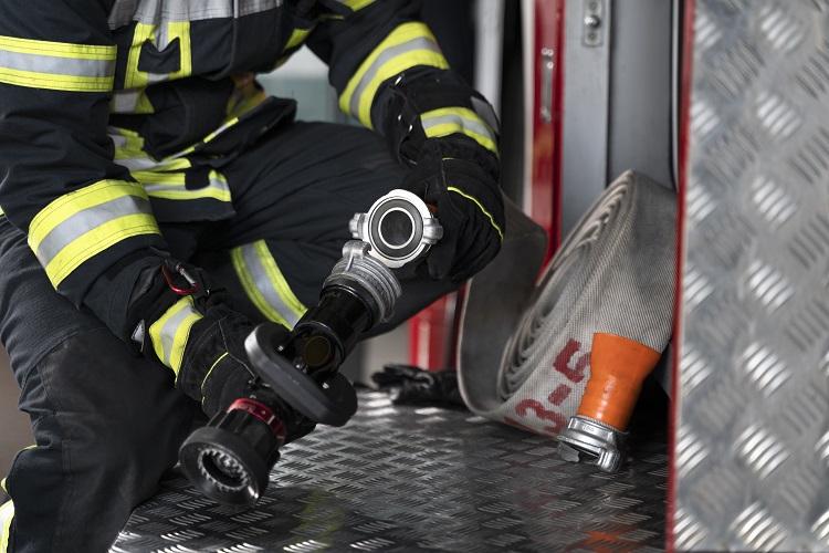 firefighter-with-safety-suit-at-the-station.jpg