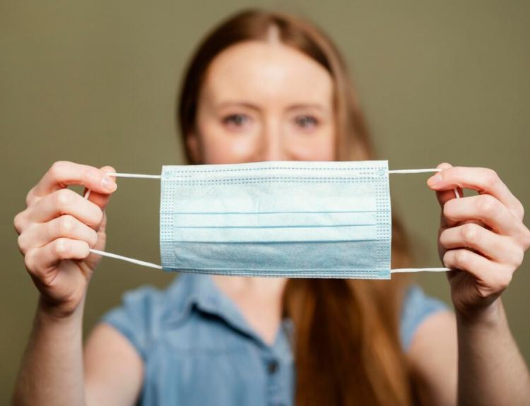 portrait-woman-with-surgical-mask_23-2148856076.jpg