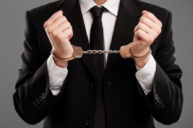 businessman-with-manacles-his-hands_144627-3844.jpg